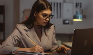 woman looking at laptop