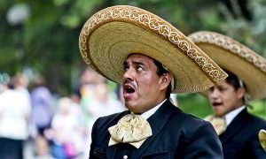 Man in sombrero singing